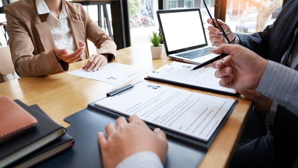 A Young Female Business women Applicant In Office Male Manager I